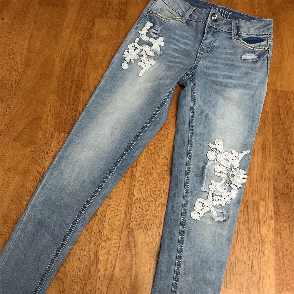 Justice mid rise light washed, lace detailed pants